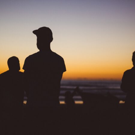 Silhouette of men at dusk